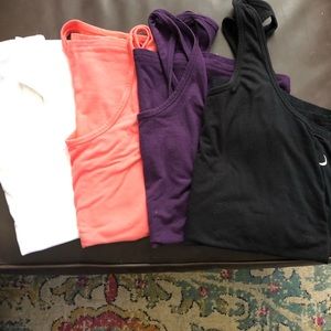 Zyia Active twist tank in black, white, flamingo and blackberry size small